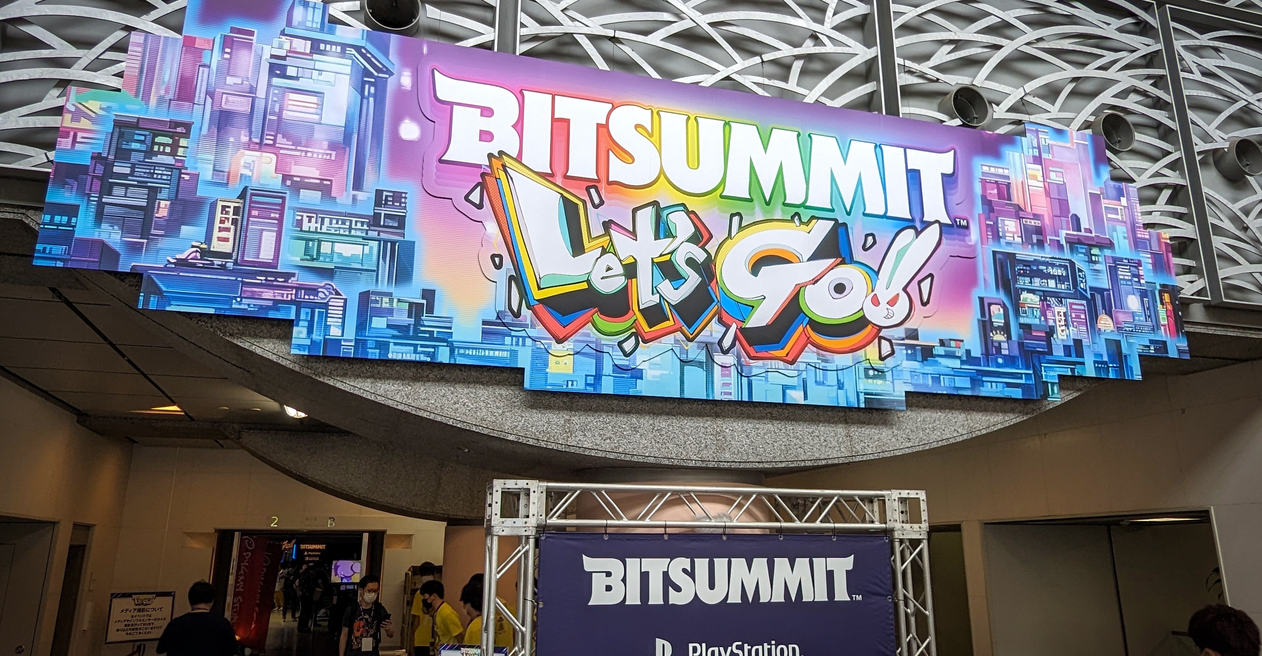 Vibrant screenshot of PlayB3yond Indie Game Fest 2025 with diverse indie game booths and colorful displays